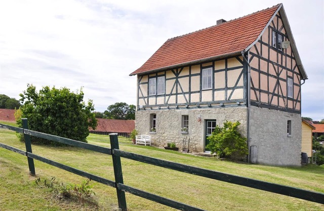 half-timbered house from the 18 century, with view on the Wartburg