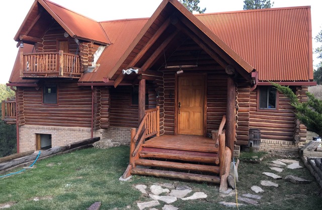 Hand Built Log Cabin in Ponderosa Forest