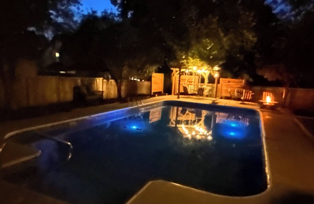heated pool, Hot Tub & deck, large media & game room, lots of room indoor & out