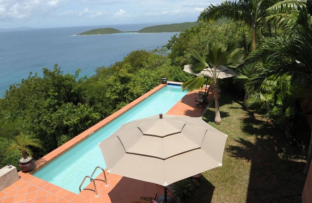HIGH ON THE HILL WITH COOLING TRADEWINDS AND SWIMMING POOL