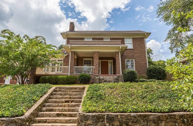 Historic Beauty: 5BR Home with Yard Near Hospital
