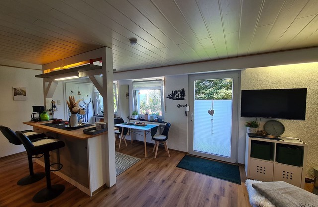 Holiday Apartment Gartenblick 50sqm with Terrace, Garden, Fireplace and Open Kitchen with Counter
