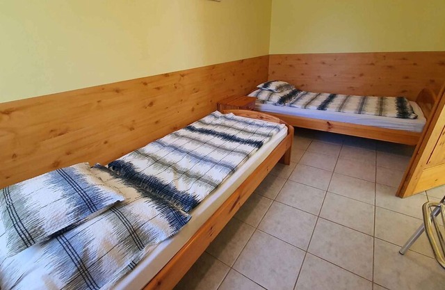 Holiday home only 80 m from the private beach, with a small boat and air conditioning
