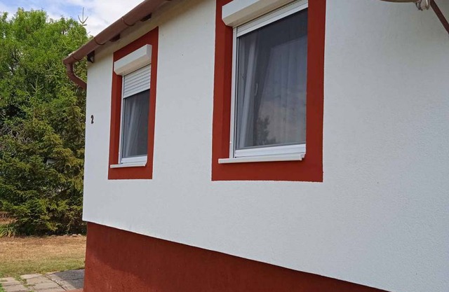 Holiday home with swing and garden shower