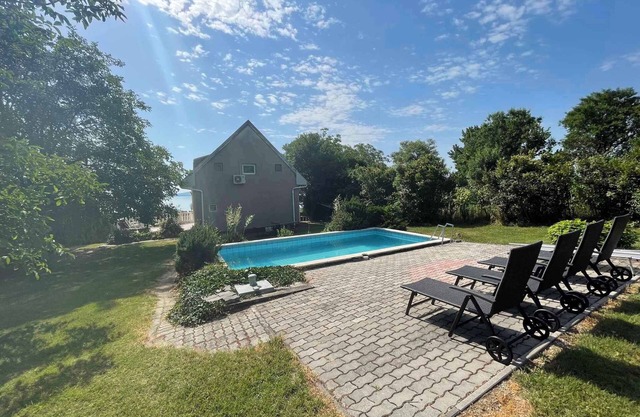 Holiday home with pool and panorama of Lake Balaton