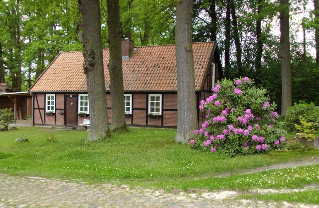 Holiday house in a timber-framed style with a sauna and a garden