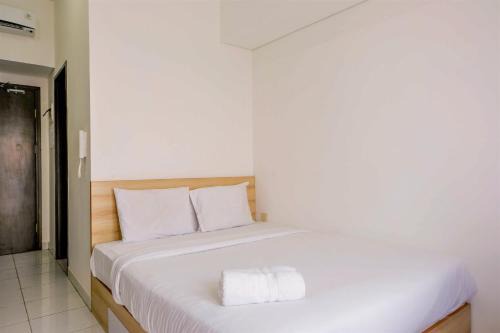 Homey Studio at Casa De Parco Apartment By Travelio