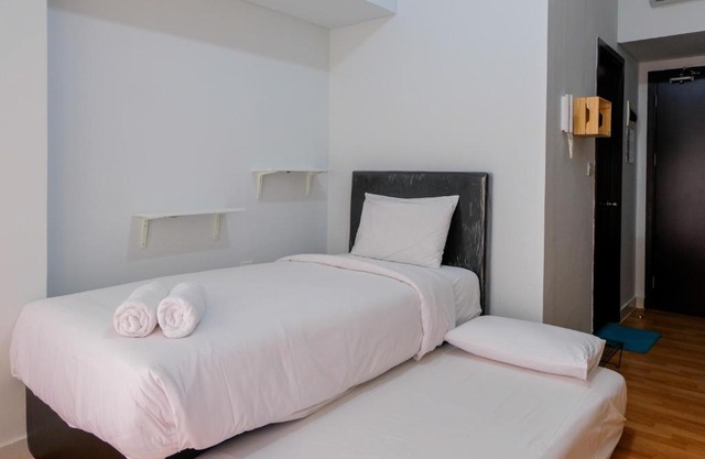 Homey Studio Room at Casa De Parco Apartment By Travelio