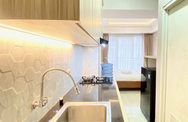 Homey Studio Room At Grand Asia Afrika Apartment