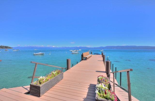 HOUSE FRONTS WHITE SAND BEACH WITH PIER ALONG TAHOE’S WEST SHORE - Dog OK
