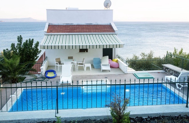 House with pool by the sea