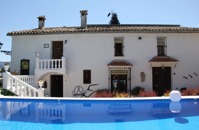 House with pool, garden, incredible views and well located.