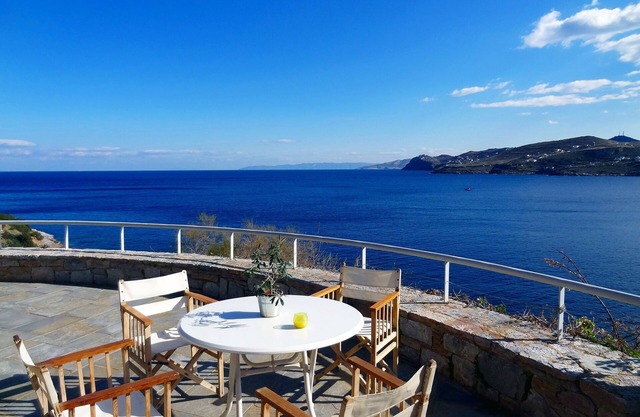 Idyllic stone and wood villa with stunning, panoramic views of the Aegean Sea