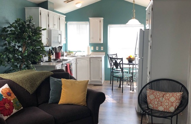 Immaculate & tastefully decorated park model in top Tucson Voyager Resort