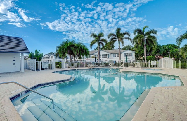 Impeccable 2BR/2BA condo with world class Pelican Bay amenities !