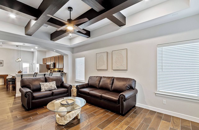 It features cozy furnishings, modern amenities, and a warm, homey atmosphere.