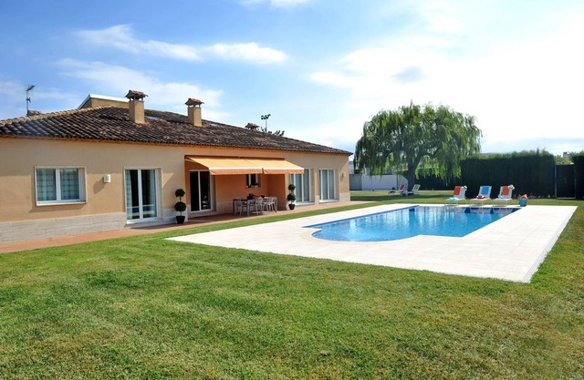 Just a 5-minute walk to the beach! Relax in style in this spacious villa.