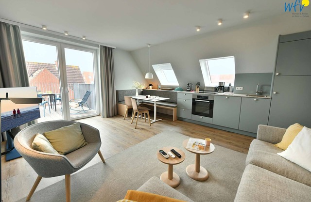Juist vacation with sunny roof terrace and private sauna!