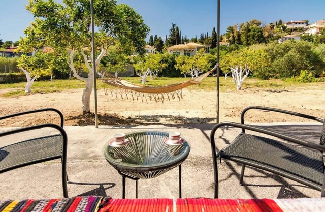 Koroni Beachfront Retreat, Private Garden Haven