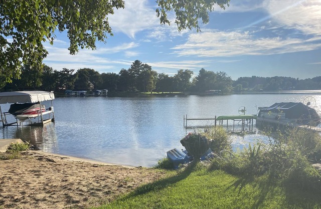 Lake front tranquility with sandy beach and waters in the bay of Lake Wisconsin