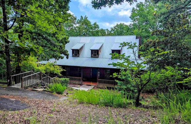 Lakefront on Greer’s Ferry in secluded upscale neighborhood.