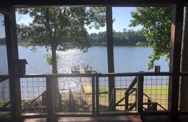 Lakefront rustic log cabin. Any season vacation, get away, or retreat.