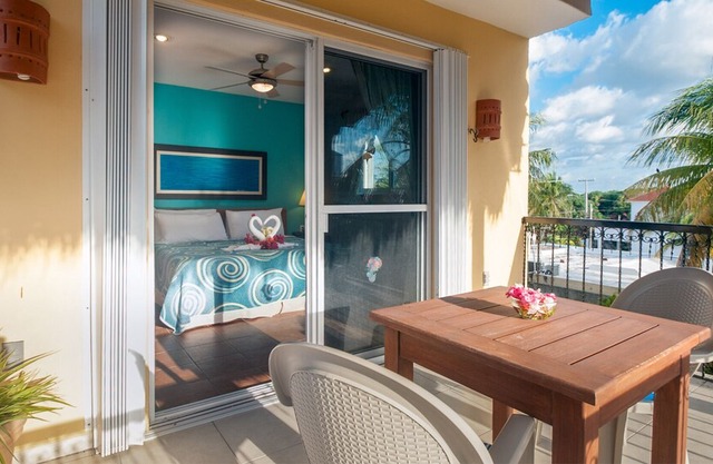 Large modern 3rd floor apartment, fresh breeze, huge deck overlooking pool