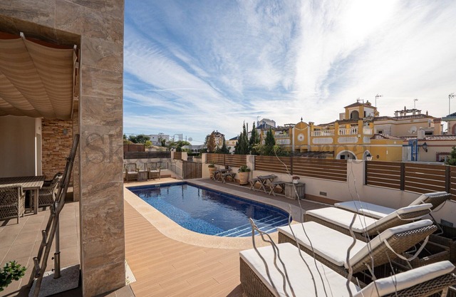 Large villa with private pool and walking distance to La Mata beach. Child-friendly.
