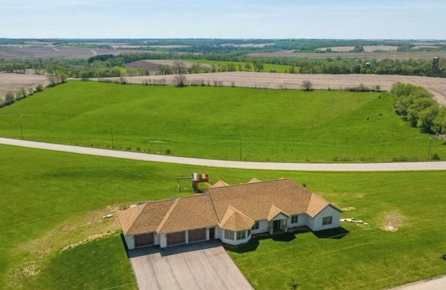 Less than one mile from the ATV Trail with a hot tub on deck to end your day!