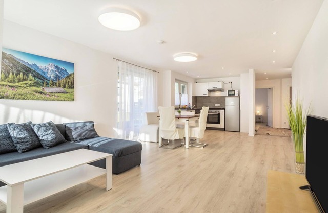 Light-flooded and Modern Apartment “Gartenstraße” with Terraces and Garden