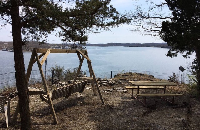Located on a bluffcliff, 80 ft off the water with a magnificent view of the Lake