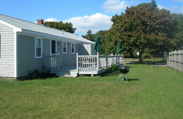 Location, Location! New listing Steps to Surf Drive Beach, sleeps 5,deck, yard