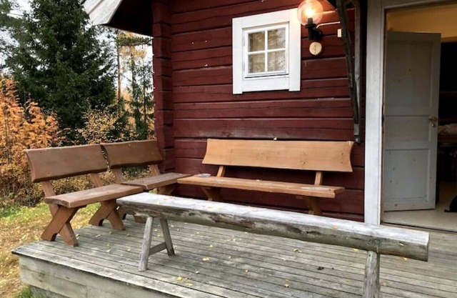 Log cabin. Ramsjö Camping . Ångevägen 24. Timber log nearby river stream