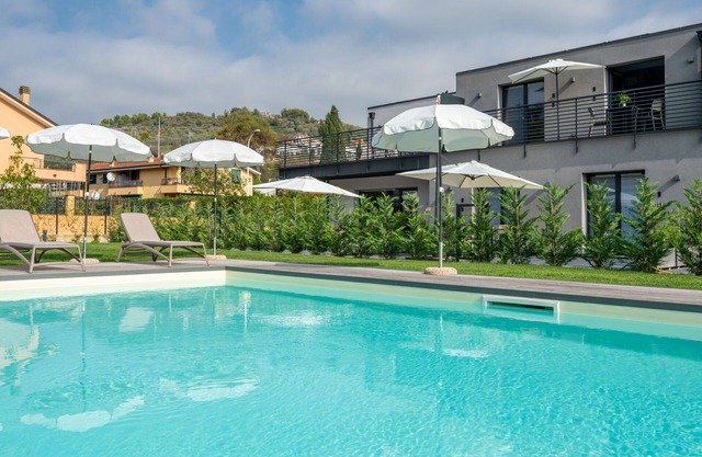 Lovely apartment for 6 people with WIFI, A/C, pool, TV, terrace, pets allowed and parking