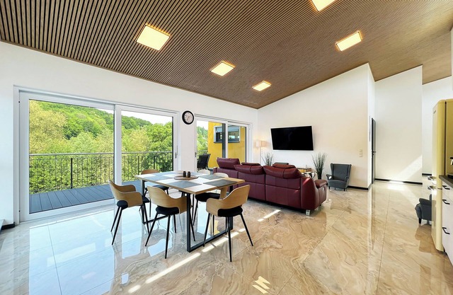 Luxurious 4-room penthouse with jacuzzi, roof terrace, parking space, e-charging station
