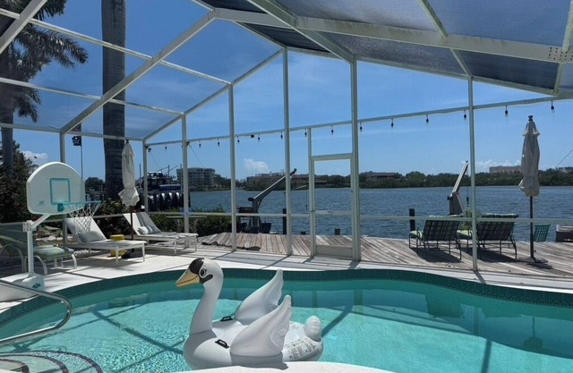 Luxury 3-bedroom pool home on the scenic Intercoastal, 1 mile from beach access.