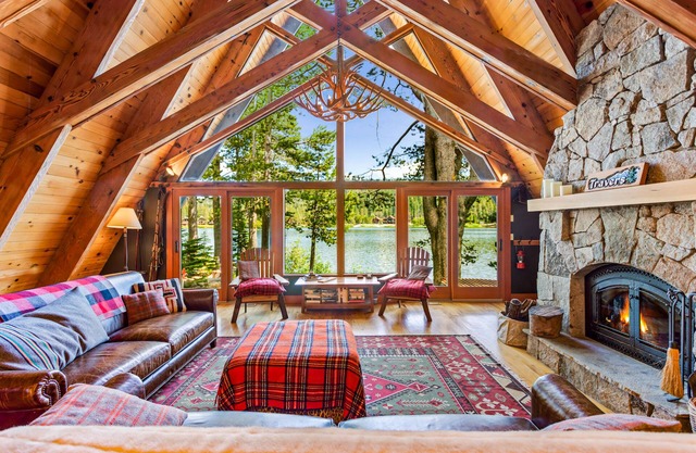 Luxury lakefront home with private hot tub, on-site dock, fireplace & HOA beach