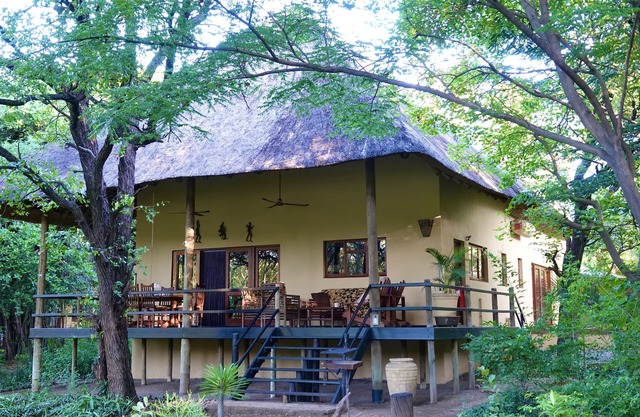 Luxury Villa 1 km from Kruger Park veranda overlooking the garden and ponds