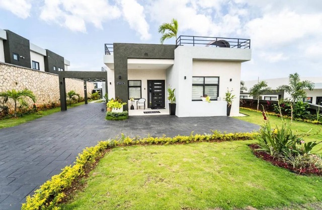 Luxury villa with a private rooftop and backyard.