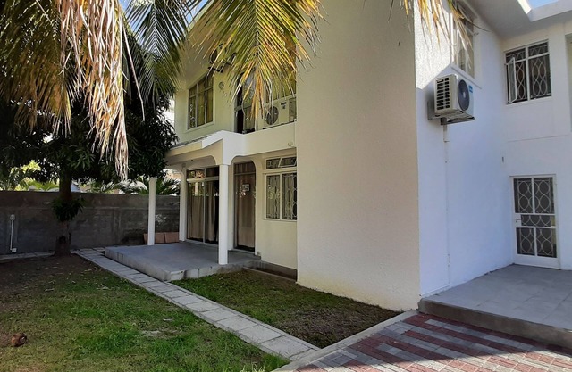 Luxury villa with secure pool 200m from Flic en Flac beach.