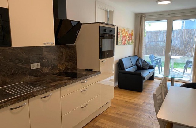 Modern apartment with garden near city center