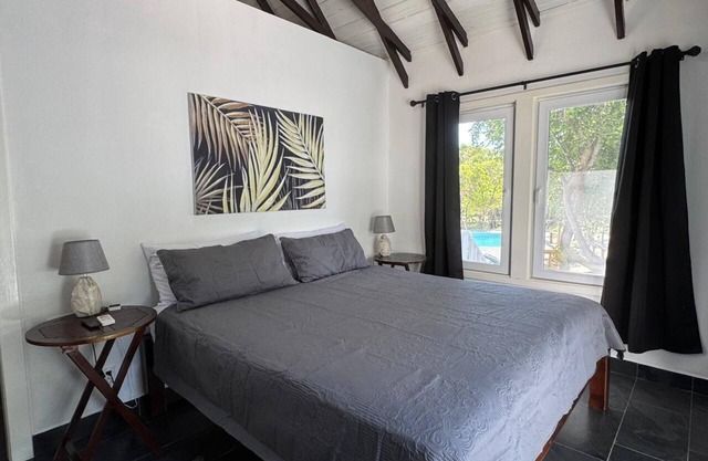Modern Beachfront Home - Steps from the Sea w/Patio, Shared Pool & Dock