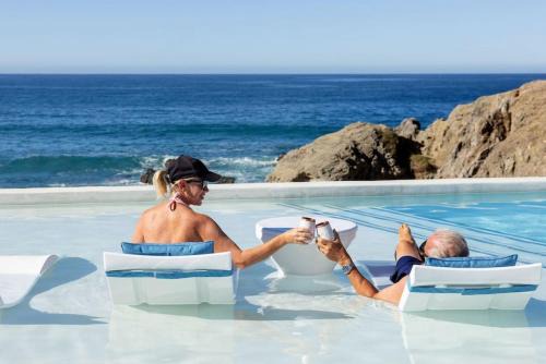 Modern Beachfront Residence with Resort Amenities