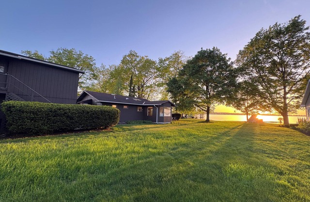Modern Lake Front home with 75' of Flat Lake Frontage