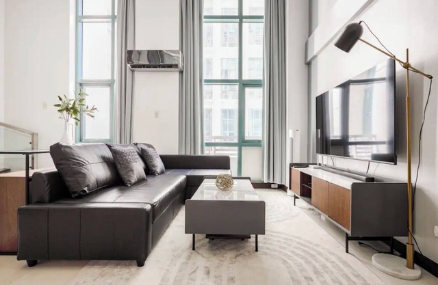 Modern Loft Apartment in Eastwood City - with gym & pool + FREE parking!