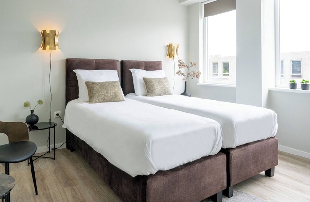 Modern Single Room in Raamsdonksveer with TV, Airconditioning and equipped shared kitchen