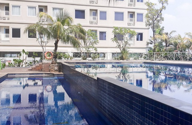 Modern Studio at Titanium Square Apartment