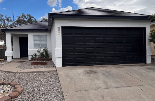 Modern Tesla Smart Home in Albuquerque – Solar Roof & EV Charging