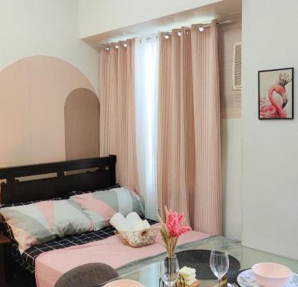 Monochromatic studio with Netflix & Pool access.