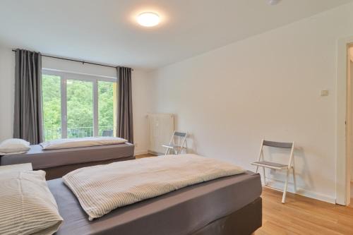 Monteurwohnungen in Trier - Parkplatz - Einzelbetten - Waschmaschine und Trockner